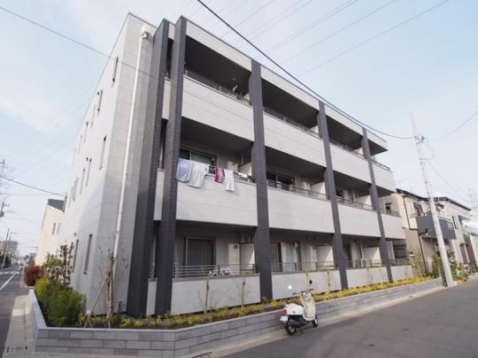 �����s������Z���̃}���V�����̌����O��